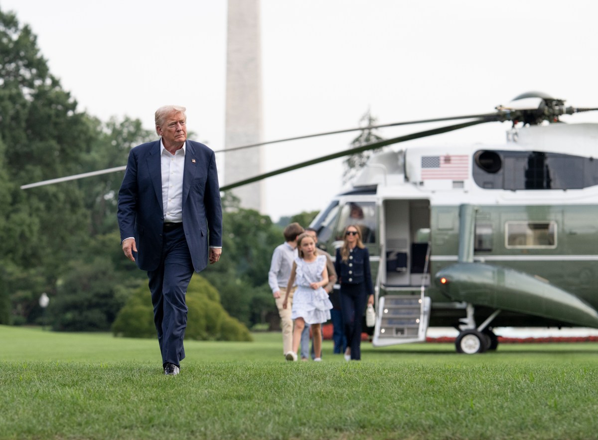 President Donald Trump disembarks Marine One on the South Lawn of the White House, Tuesday, July 29, 2025, after a trip to Scotland. (Official White House Photo by Molly Riley)