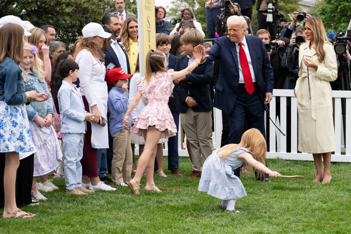 President Donald Trump and First Lady Melania Trump blow whistles to kick off a race at the White House Easter Egg Roll, Monday, April 21, 2025, on the South Lawn. (Official White House Photo by Andrea Hanks)