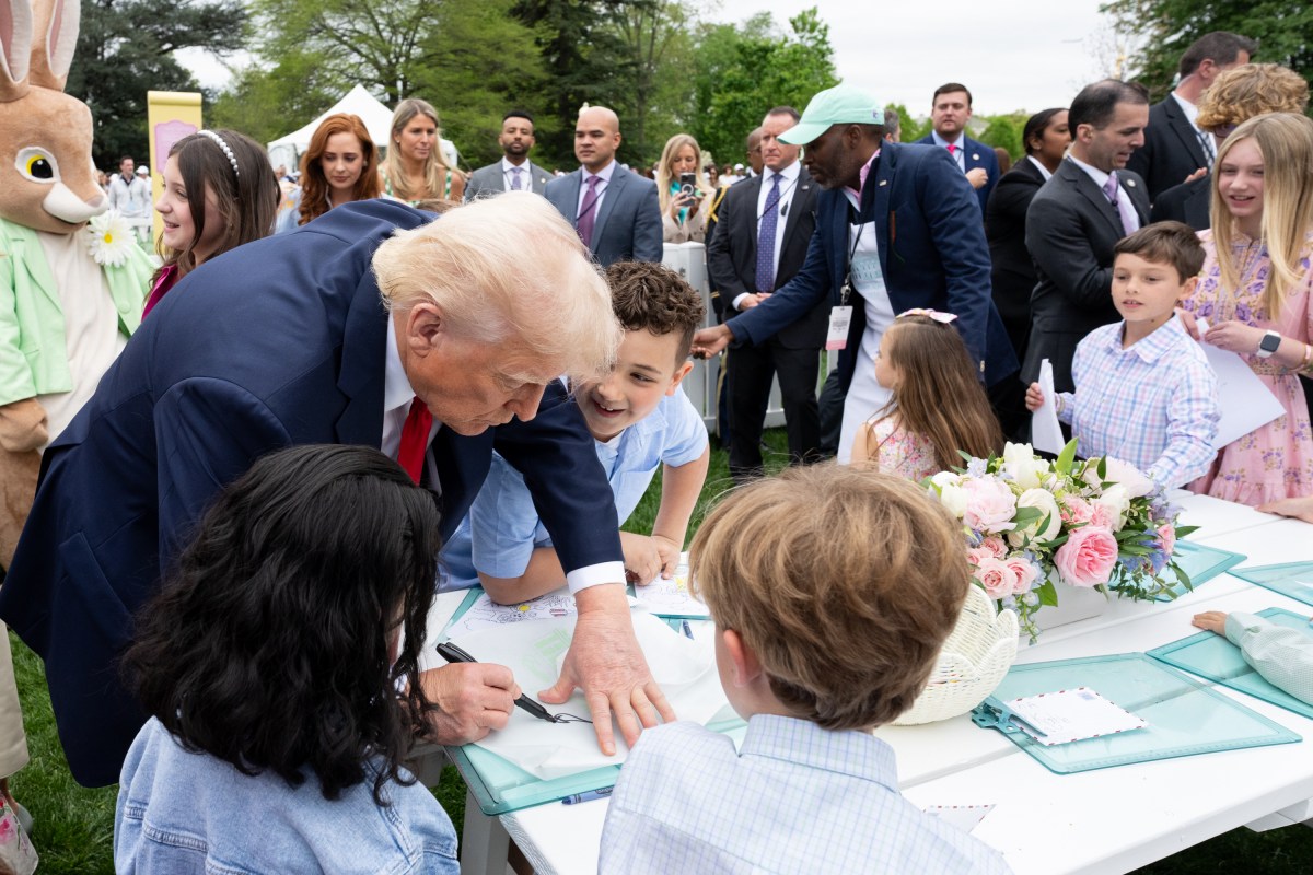 President Donald Trump and First Lady Melania Trump stop at the Cards for Troops activity at the White House Easter Egg Roll, Monday, April 21, 2025, on the South Lawn. (Official White House Photo by Andrea Hanks)