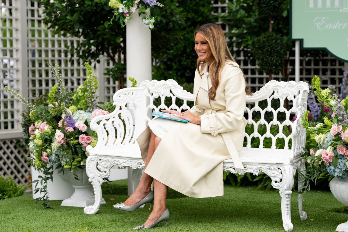 First Lady Melania Trump reads a book at the Reading Nook in the First Ladies Garden during the White House Easter Egg Roll, Monday, April 21, 2025, on the South Lawn. (Official White House Photo by Andrea Hanks)