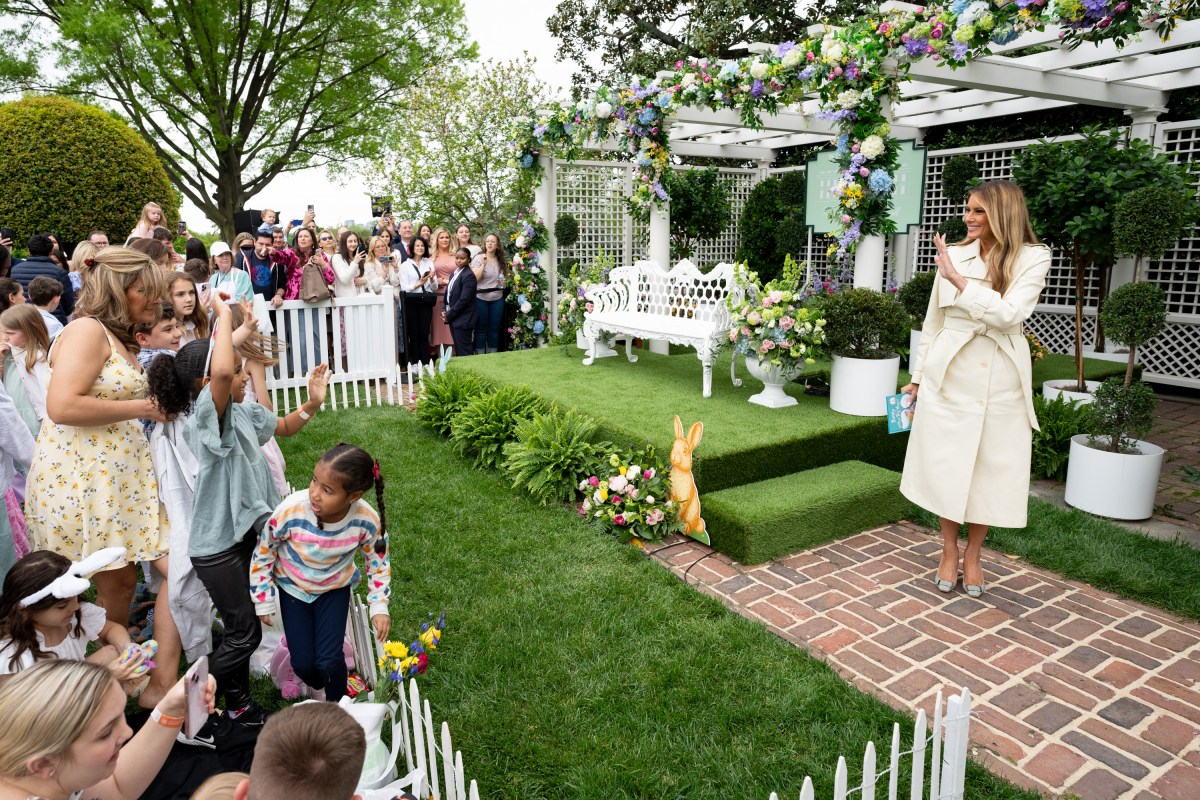First Lady Melania Trump reads a book at the Reading Nook in the First Ladies Garden during the White House Easter Egg Roll, Monday, April 21, 2025, on the South Lawn. (Official White House Photo by Andrea Hanks)