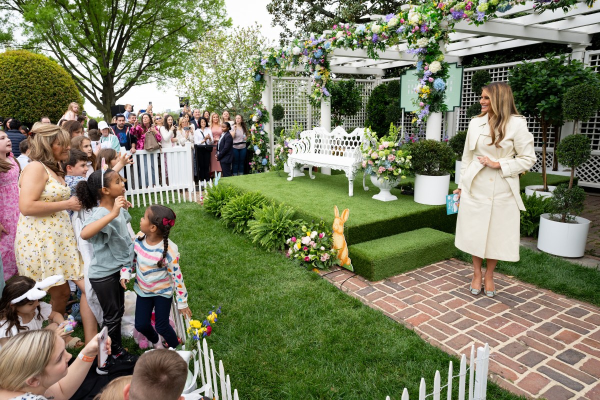 First Lady Melania Trump reads a book at the Reading Nook in the First Ladies Garden during the White House Easter Egg Roll, Monday, April 21, 2025, on the South Lawn. (Official White House Photo by Andrea Hanks)