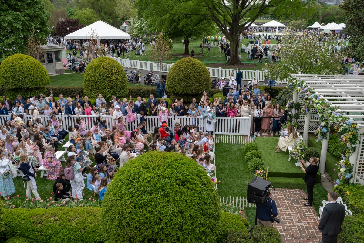 First Lady Melania Trump reads a book at the Reading Nook in the First Ladies Garden during the White House Easter Egg Roll, Monday, April 21, 2025, on the South Lawn.(Official White House Photo by Carlos Fyfe)