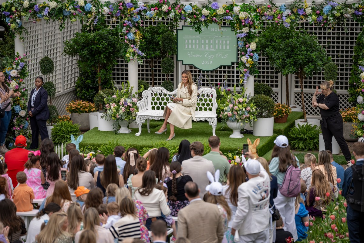 First Lady Melania Trump reads a book at the Reading Nook in the First Ladies Garden during the White House Easter Egg Roll, Monday, April 21, 2025, on the South Lawn.(Official White House Photo by Carlos Fyfe)