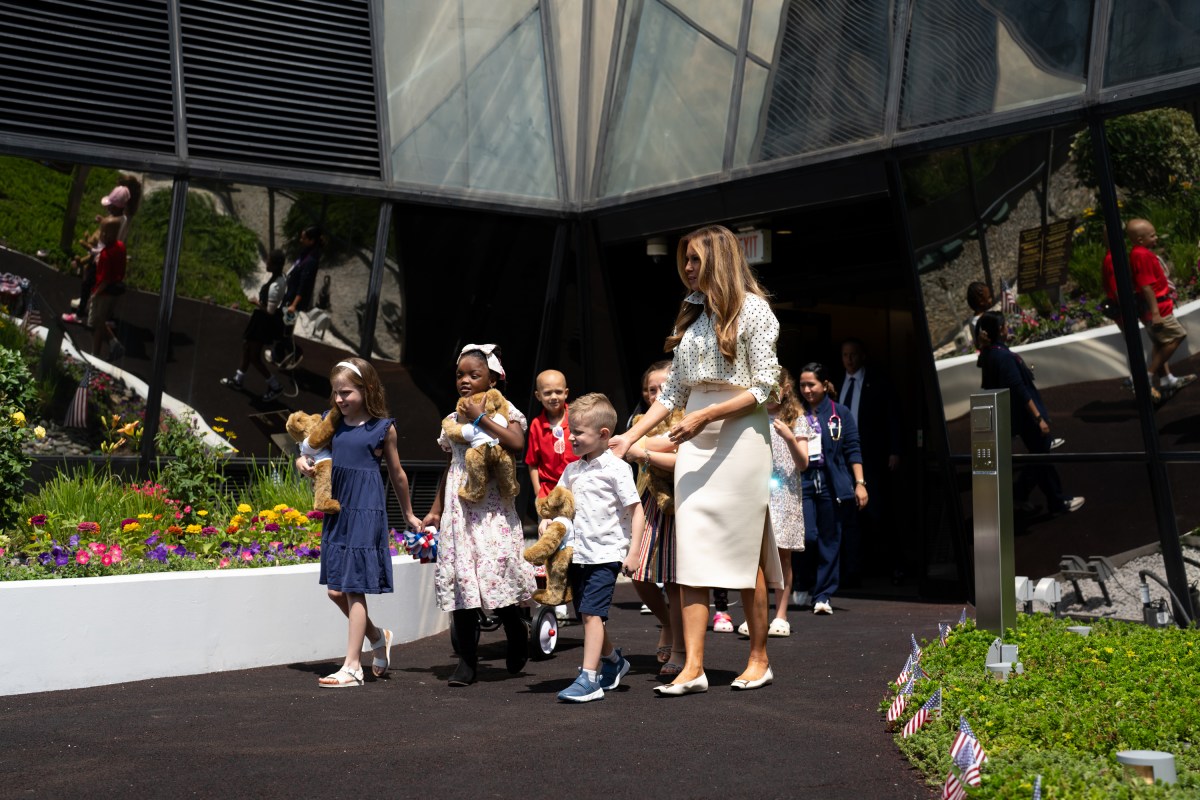 First Lady Melania Trump helps young patients decorate the Bunny Mellon Healing Garden at Children’s National Hospital for the 4th of July, Thursday, July 3, 2025, in Washington, D.C.(Official White House Photo by Andrea Hanks)