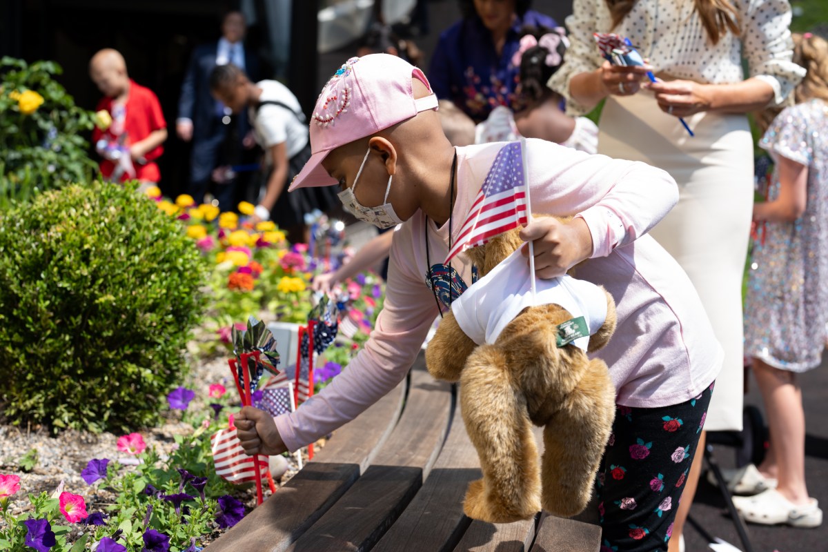 First Lady Melania Trump helps young patients decorate the Bunny Mellon Healing Garden at Children’s National Hospital for the 4th of July, Thursday, July 3, 2025, in Washington, D.C.(Official White House Photo by Andrea Hanks)