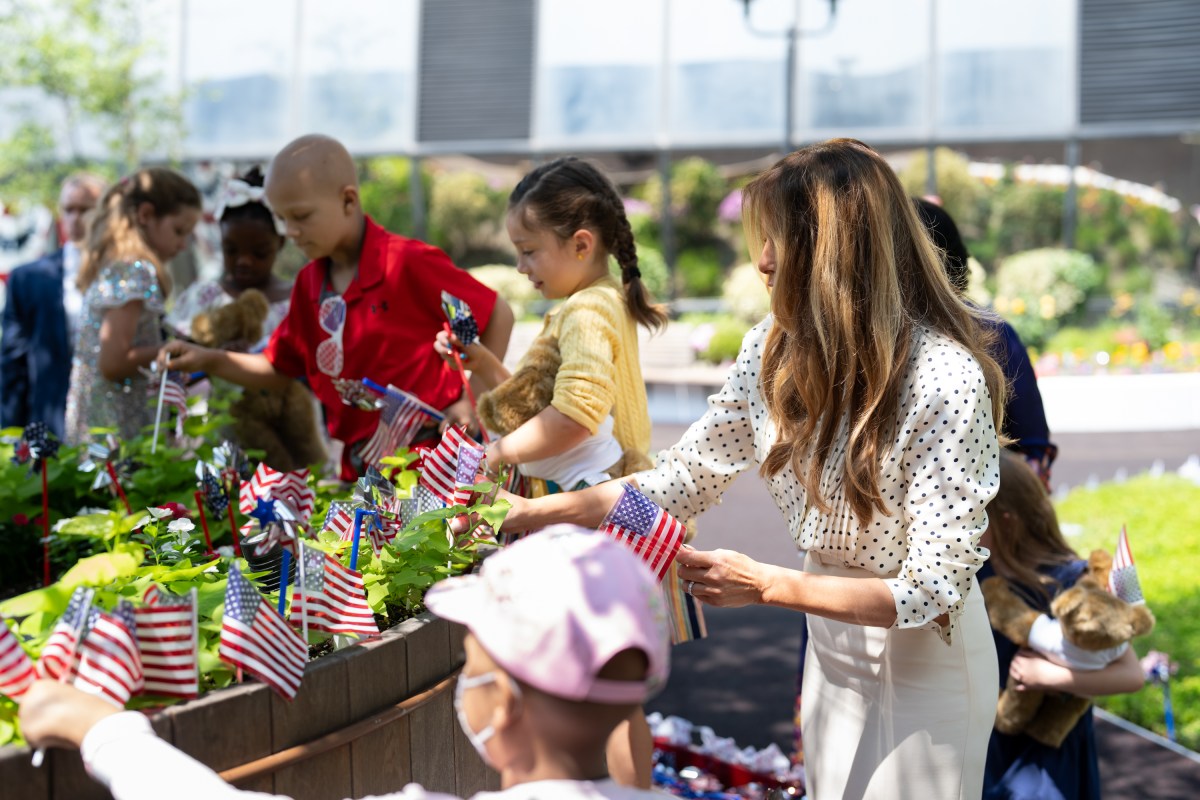 First Lady Melania Trump helps young patients decorate the Bunny Mellon Healing Garden at Children’s National Hospital for the 4th of July, Thursday, July 3, 2025, in Washington, D.C.(Official White House Photo by Andrea Hanks)