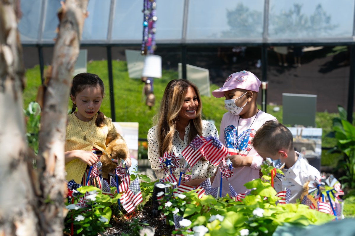 First Lady Melania Trump helps young patients decorate the Bunny Mellon Healing Garden at Children’s National Hospital for the 4th of July, Thursday, July 3, 2025, in Washington, D.C.(Official White House Photo by Andrea Hanks)