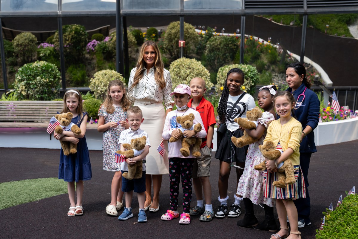 First Lady Melania Trump poses for a photo with young patients in the Bunny Mellon Healing Garden at Children’s National Hospital in Washington, D.C., Thursday, July 3, 2025.(Official White House Photo by Andrea Hanks)