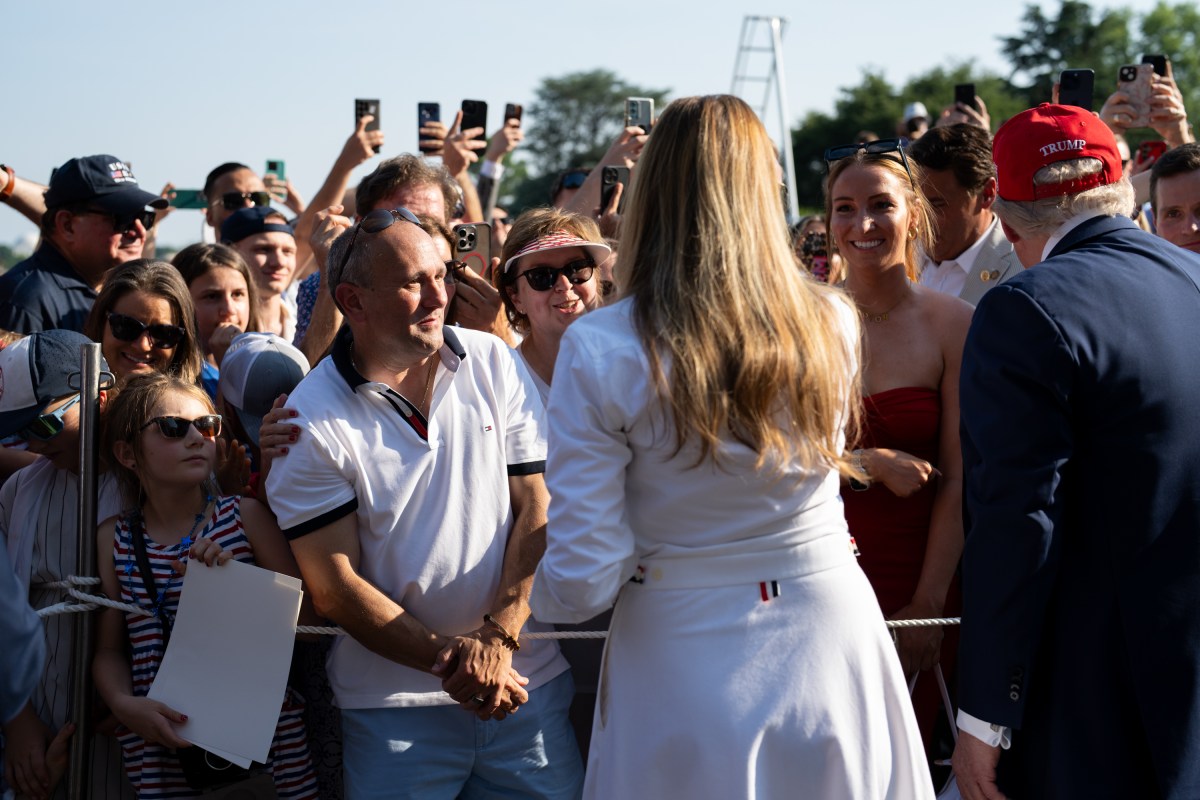 President Donald Trump and First Lady Melania Trump greet guests along a rope line on the South Lawn of the White House, Friday, July 4, 2025, during the 4th of July picnic. (Official White House Photo by Andrea Hanks)