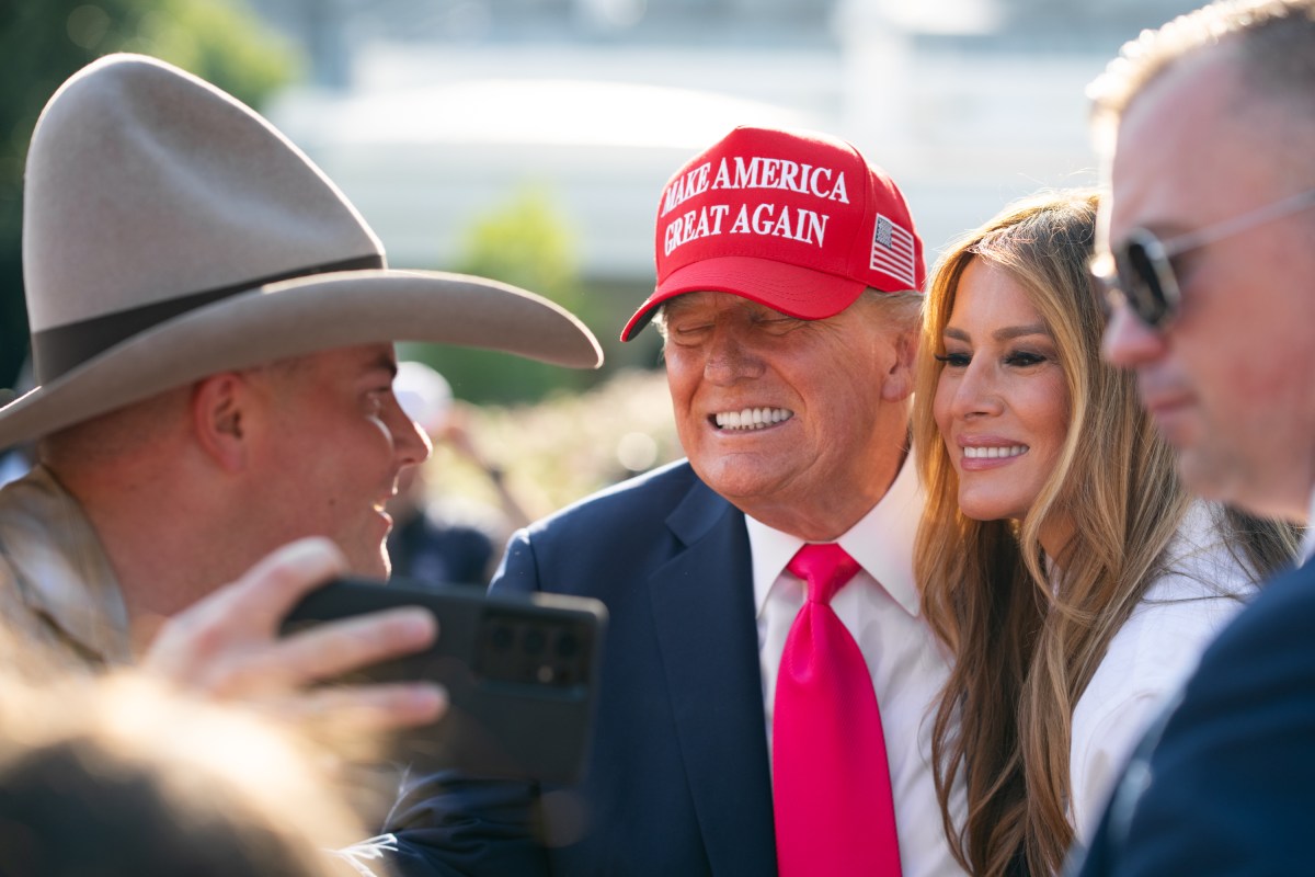 President Donald Trump and First Lady Melania Trump greet guests along a rope line on the South Lawn of the White House, Friday, July 4, 2025, during the 4th of July picnic. (Official White House Photo by Andrea Hanks)