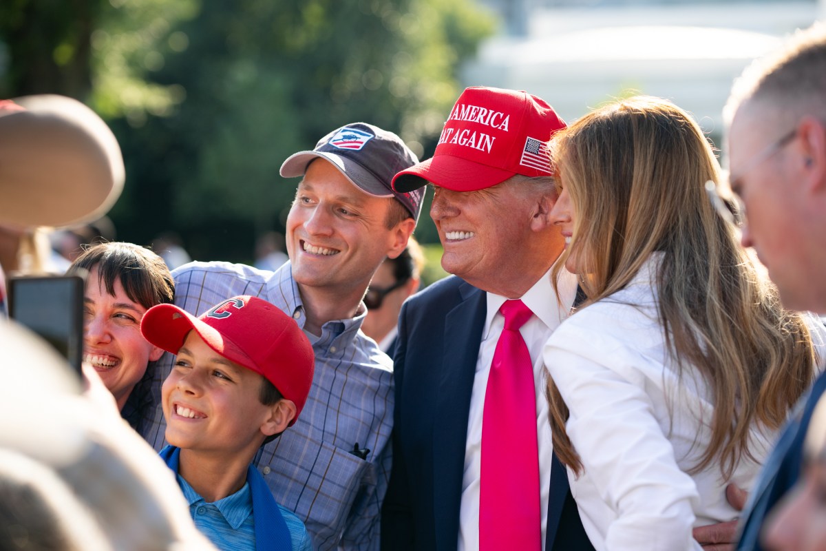 President Donald Trump and First Lady Melania Trump greet guests along a rope line on the South Lawn of the White House, Friday, July 4, 2025, during the 4th of July picnic. (Official White House Photo by Andrea Hanks)
