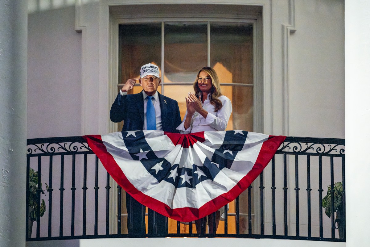 President Donald Trump and First Lady Melania Trump view a 4th of July fireworks display over the National Mall from the Blue Room Balcony, Friday, July 4, 2025. (Official White House Photo by Carlos Fyfe)