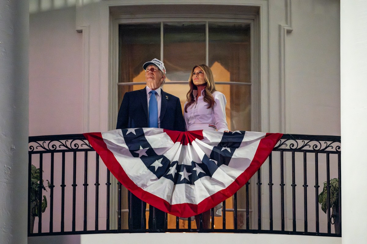 President Donald Trump and First Lady Melania Trump view a 4th of July fireworks display over the National Mall from the Blue Room Balcony, Friday, July 4, 2025. (Official White House Photo by Carlos Fyfe)