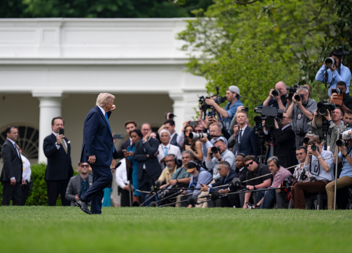 President Donald Trump gestures to the media before boarding Marine One on the South Lawn of the White House, Thursday, May 1, 2025, en route to Joint Base Andrews for a trip to Alabama. (Official White House Photo by Molly Riley)