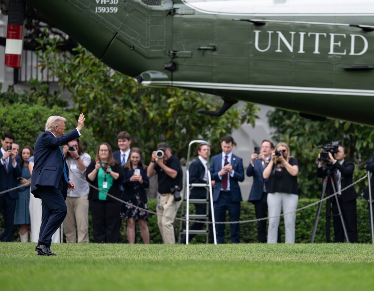 President Donald Trump waves to the media before boarding Marine One on the South Lawn of the White House, Thursday, May 1, 2025, en route to Joint Base Andrews for a trip to Alabama. (Official White House Photo by Molly Riley)