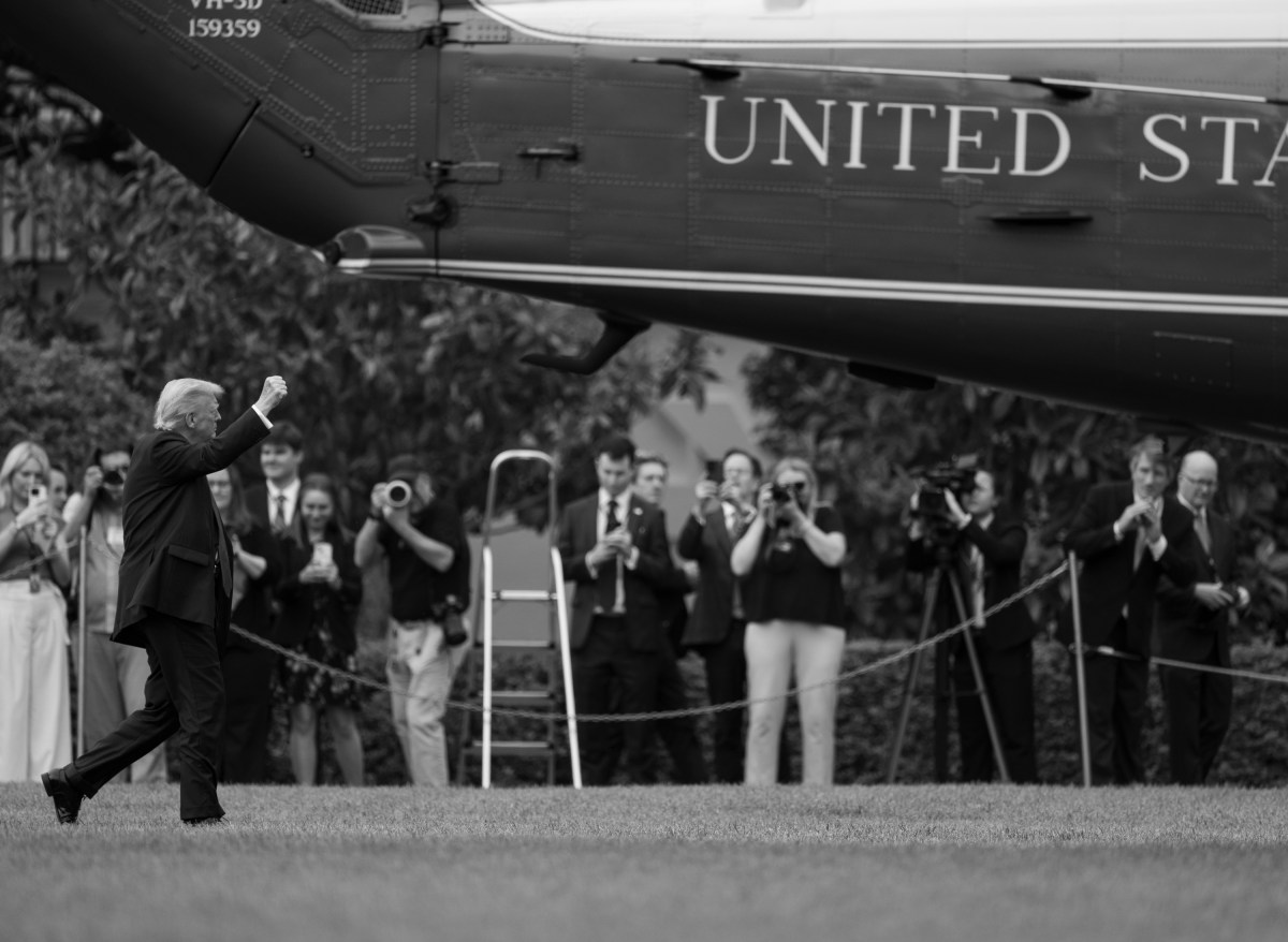 President Donald Trump gestures to the media before boarding Marine One on the South Lawn of the White House, Thursday, May 1, 2025, en route to Joint Base Andrews for a trip to Alabama. (Official White House Photo by Molly Riley)