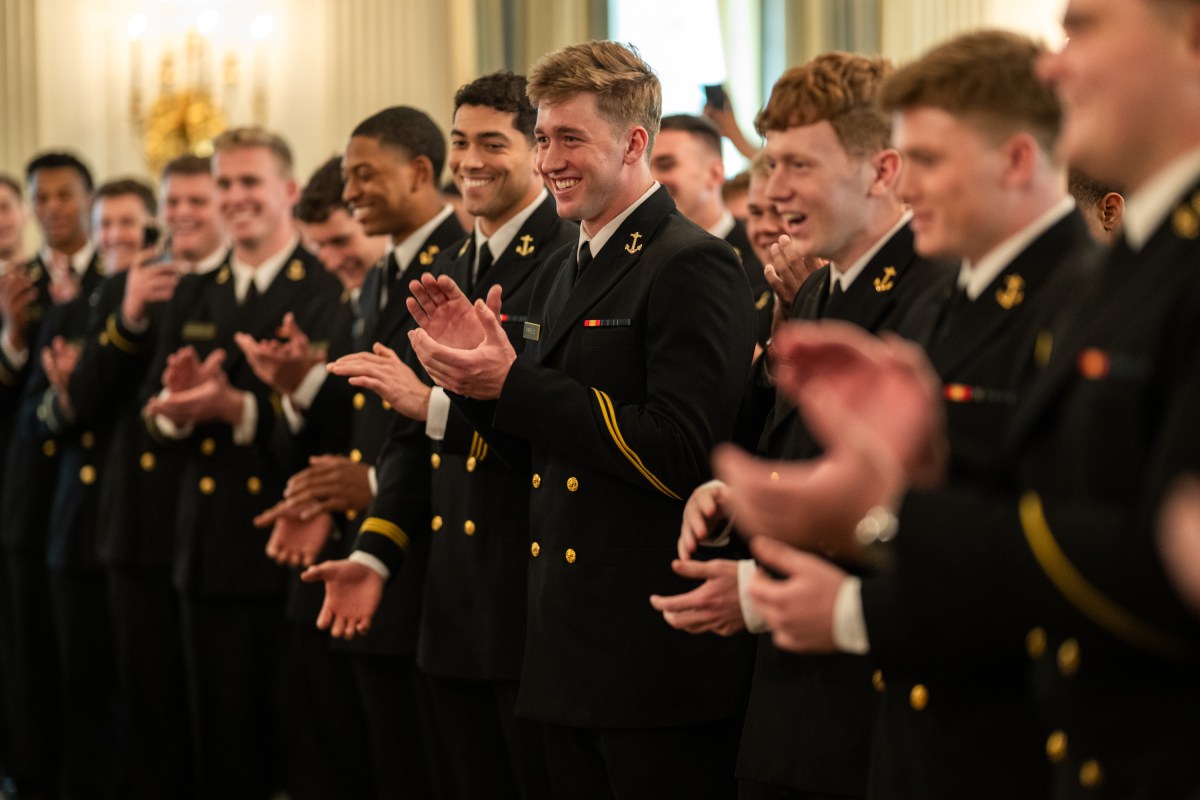 President Donald Trump greets members of the Navy Midshipmen football team from the U.S. Naval Academy, Tuesday, April 15, 2025, in the State Dining Room of the White House. (Official White House Photo by Daniel Torok)