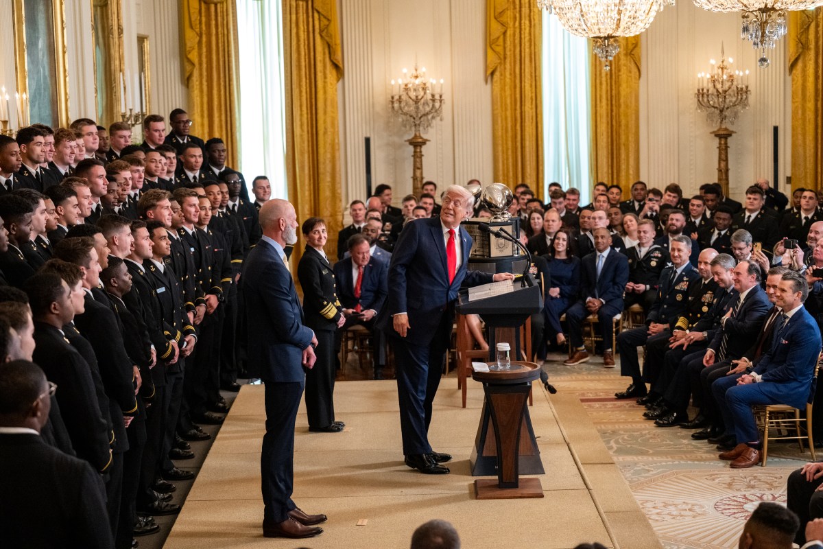 President Donald Trump greets members of the Navy Midshipmen football team from the U.S. Naval Academy, Tuesday, April 15, 2025, in the State Dining Room of the White House. (Official White House Photo by Molly Riley)