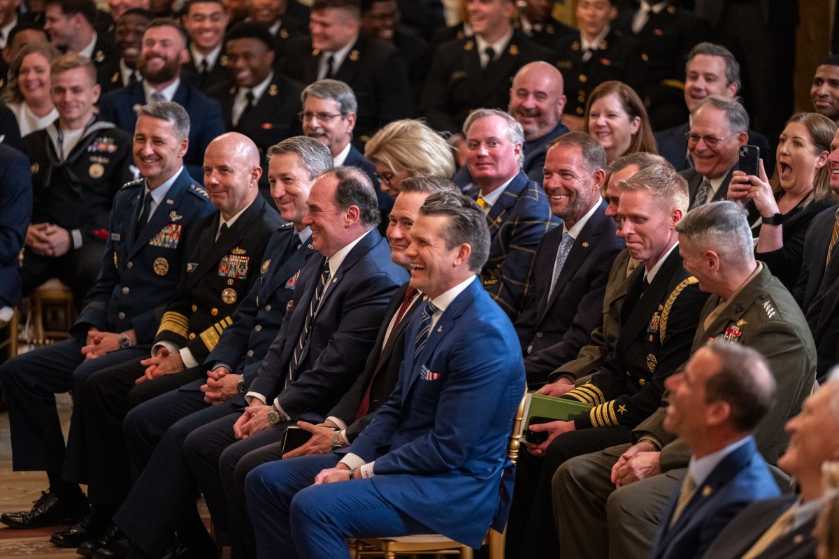 President Donald Trump greets members of the Navy Midshipmen football team from the U.S. Naval Academy, Tuesday, April 15, 2025, in the State Dining Room of the White House. (Official White House Photo by Molly Riley)