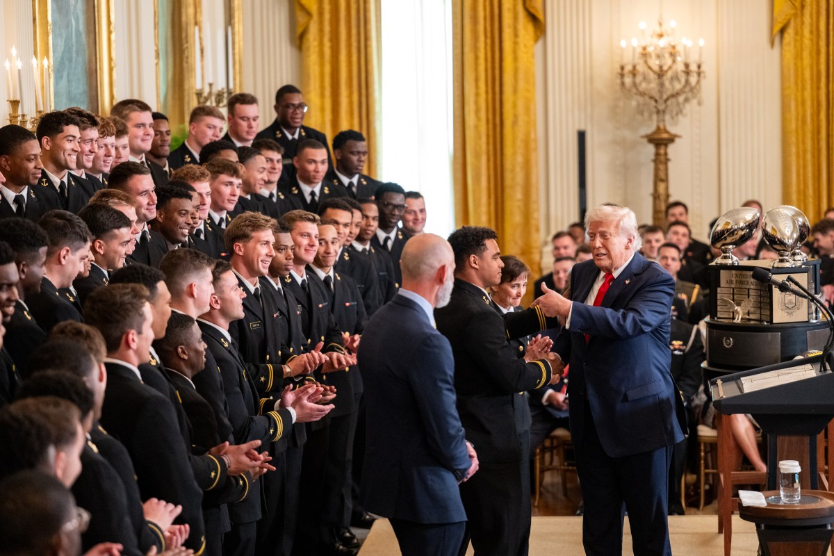 President Donald Trump greets members of the Navy Midshipmen football team from the U.S. Naval Academy, Tuesday, April 15, 2025, in the State Dining Room of the White House. (Official White House Photo by Molly Riley)