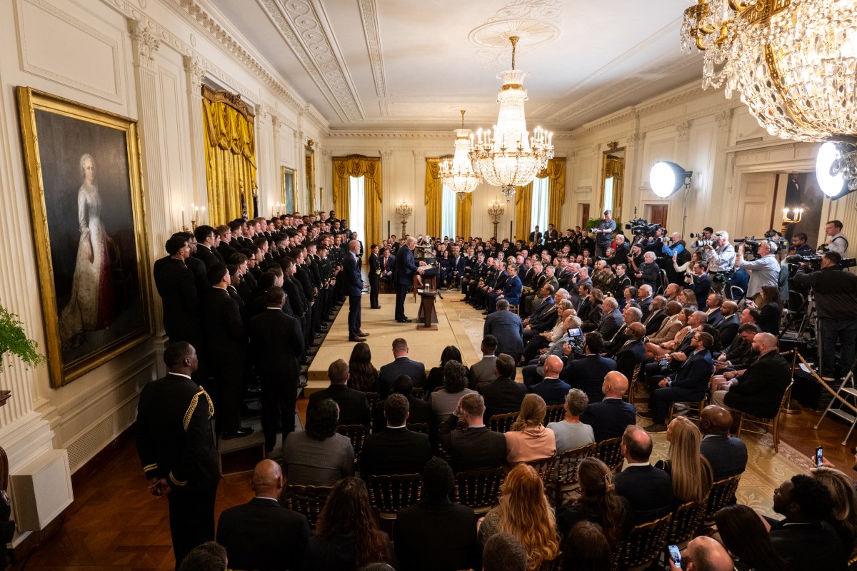 President Donald Trump greets members of the Navy Midshipmen football team from the U.S. Naval Academy, Tuesday, April 15, 2025, in the State Dining Room of the White House. (Official White House Photo by Molly Riley)
