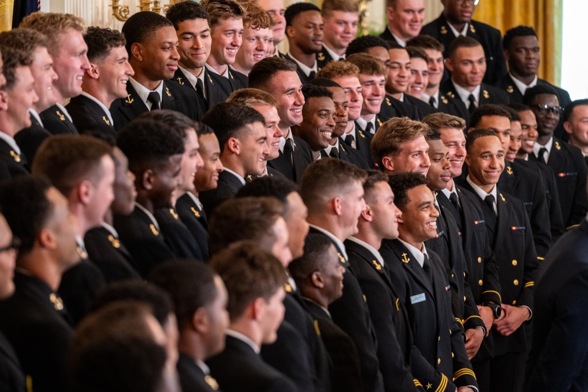 President Donald Trump greets members of the Navy Midshipmen football team from the U.S. Naval Academy, Tuesday, April 15, 2025, in the State Dining Room of the White House. (Official White House Photo by Molly Riley)