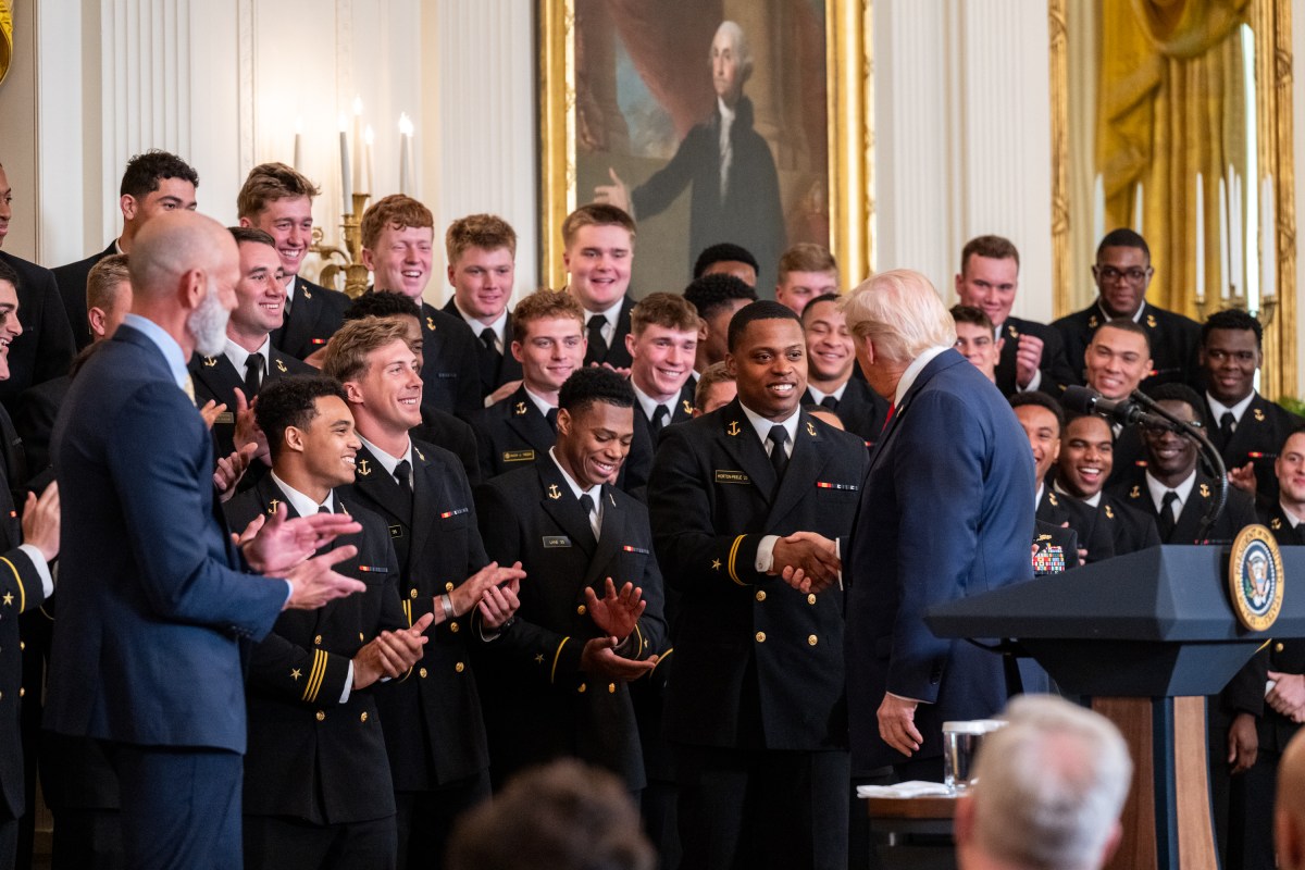 President Donald Trump greets members of the Navy Midshipmen football team from the U.S. Naval Academy, Tuesday, April 15, 2025, in the State Dining Room of the White House. (Official White House Photo by Molly Riley)