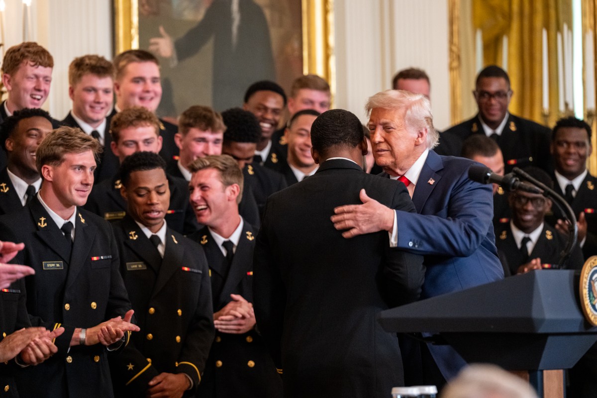 President Donald Trump greets members of the Navy Midshipmen football team from the U.S. Naval Academy, Tuesday, April 15, 2025, in the State Dining Room of the White House. (Official White House Photo by Molly Riley)