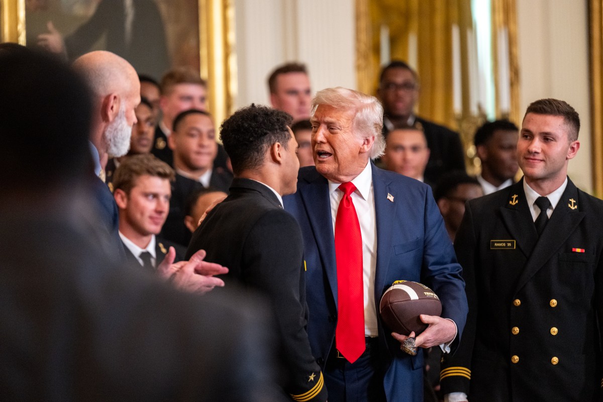 President Donald Trump greets members of the Navy Midshipmen football team from the U.S. Naval Academy, Tuesday, April 15, 2025, in the State Dining Room of the White House. (Official White House Photo by Molly Riley)