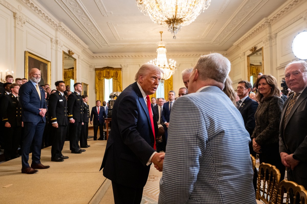 President Donald Trump greets members of the Navy Midshipmen football team from the U.S. Naval Academy, Tuesday, April 15, 2025, in the State Dining Room of the White House. (Official White House Photo by Molly Riley)