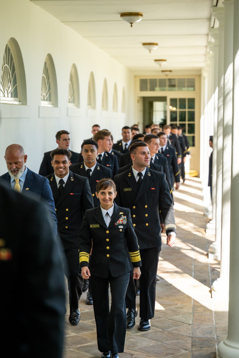 President Donald Trump greets members of the Navy Midshipmen football team from the U.S. Naval Academy, Tuesday, April 15, 2025, in the State Dining Room of the White House. (Official White House Photo by Molly Riley)