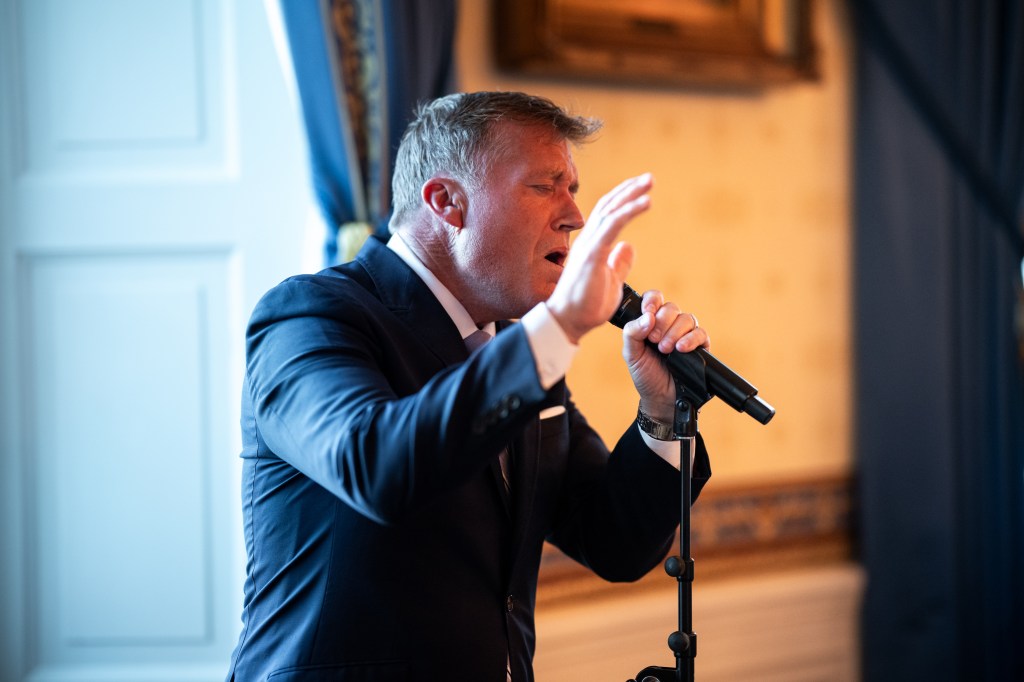 Singer Charles Billingsley performs at an Easter prayer service and dinner, Wednesday, April 16, 2025, in the Blue Room of the White House. (Official White House Photo by Joyce N. Boghosian)