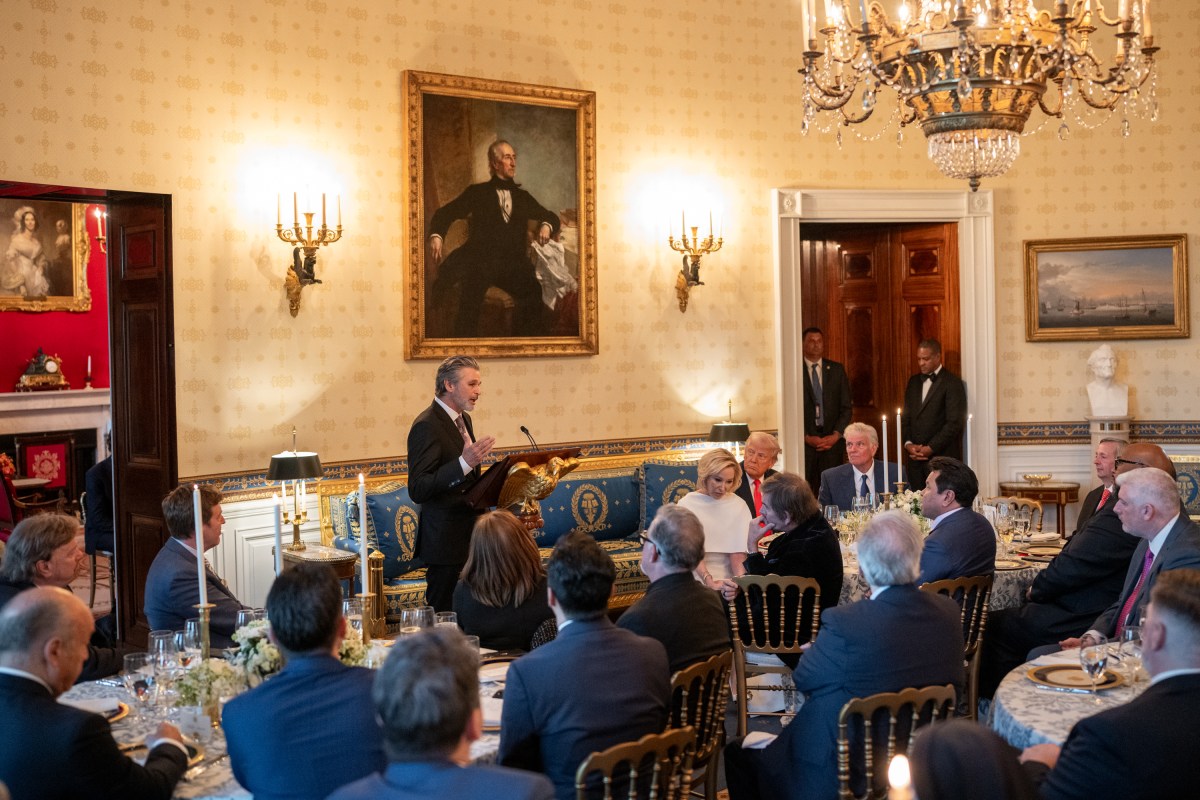 Pastor Jentezen Franklin delivers a blessing over the food at an Easter prayer service and dinner, Wednesday, April 16, 2025, in the Blue Room of the White House. (Official White House Photo by Joyce N. Boghosian)