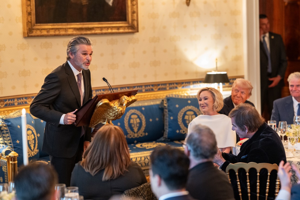 Pastor Jentezen Franklin delivers a blessing over the food at an Easter prayer service and dinner, Wednesday, April 16, 2025, in the Blue Room of the White House. (Official White House Photo by Joyce N. Boghosian)