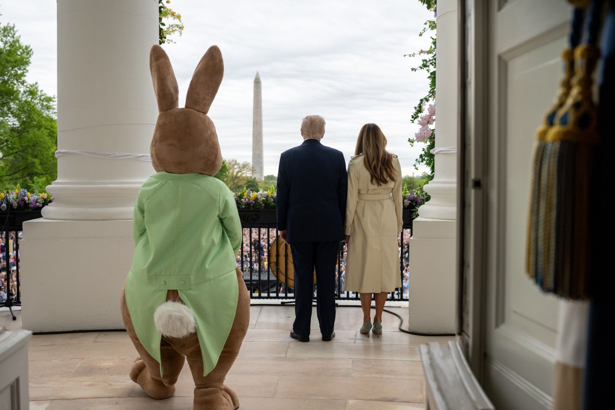 President Donald Trump and First Lady Melania Trump are accompanied by the Easter Bunny as they wave to the crowd from the Blue Room Balcony, Monday, April 21, 2025, during the annual White House Easter Egg Roll on the South Lawn. (Official White House Photo by Daniel Torok)