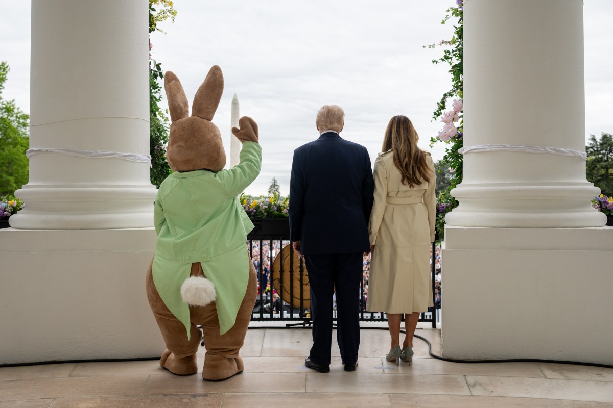 President Donald Trump and First Lady Melania Trump are accompanied by the Easter Bunny as they wave to the crowd from the Blue Room Balcony, Monday, April 21, 2025, during the annual White House Easter Egg Roll on the South Lawn. (Official White House Photo by Daniel Torok)