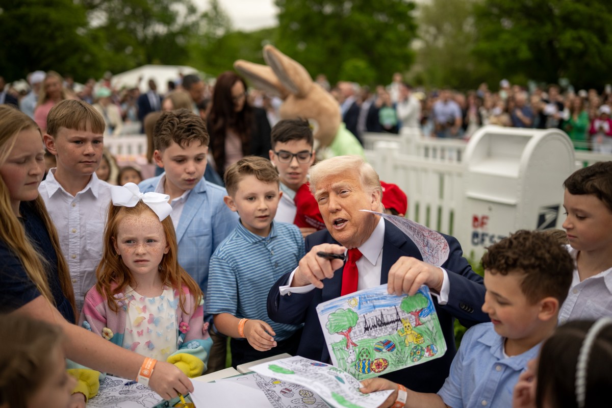 President Donald Trump colors with children at the White House Easter Egg Roll, Monday, April 21, 2025, on the South Lawn. (Official White House Photo by Daniel Torok)