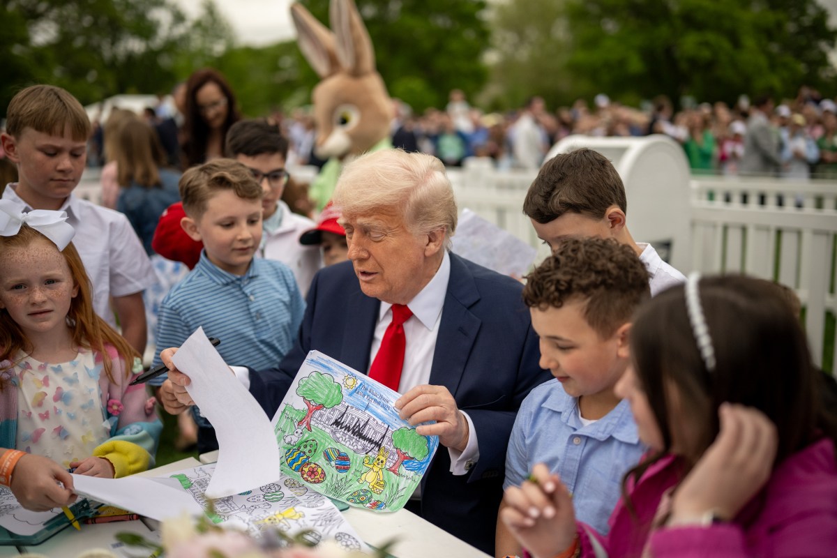 President Donald Trump colors with children at the White House Easter Egg Roll, Monday, April 21, 2025, on the South Lawn. (Official White House Photo by Daniel Torok)