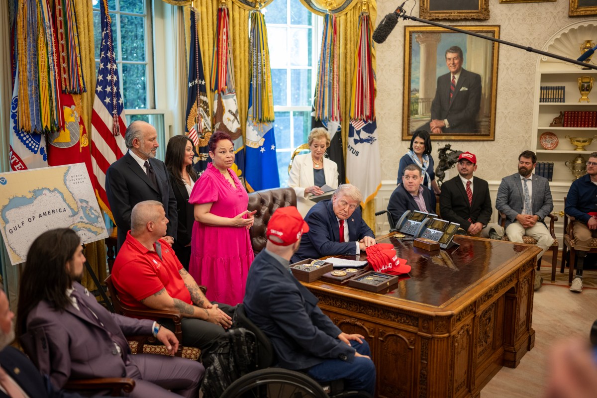 President Donald Trump signs executive orders alongside Secretary of Education Linda McMahon and wounded warriors in the Oval Office, Wednesday, April 23, 2025. (Official White House Photo by Daniel Torok)