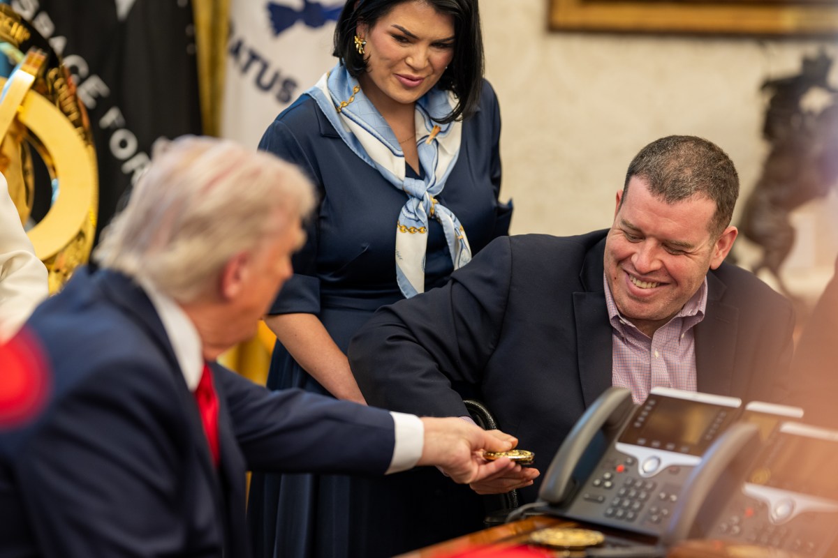 President Donald Trump signs executive orders alongside Secretary of Education Linda McMahon and wounded warriors in the Oval Office, Wednesday, April 23, 2025. (Official White House Photo by Daniel Torok)
