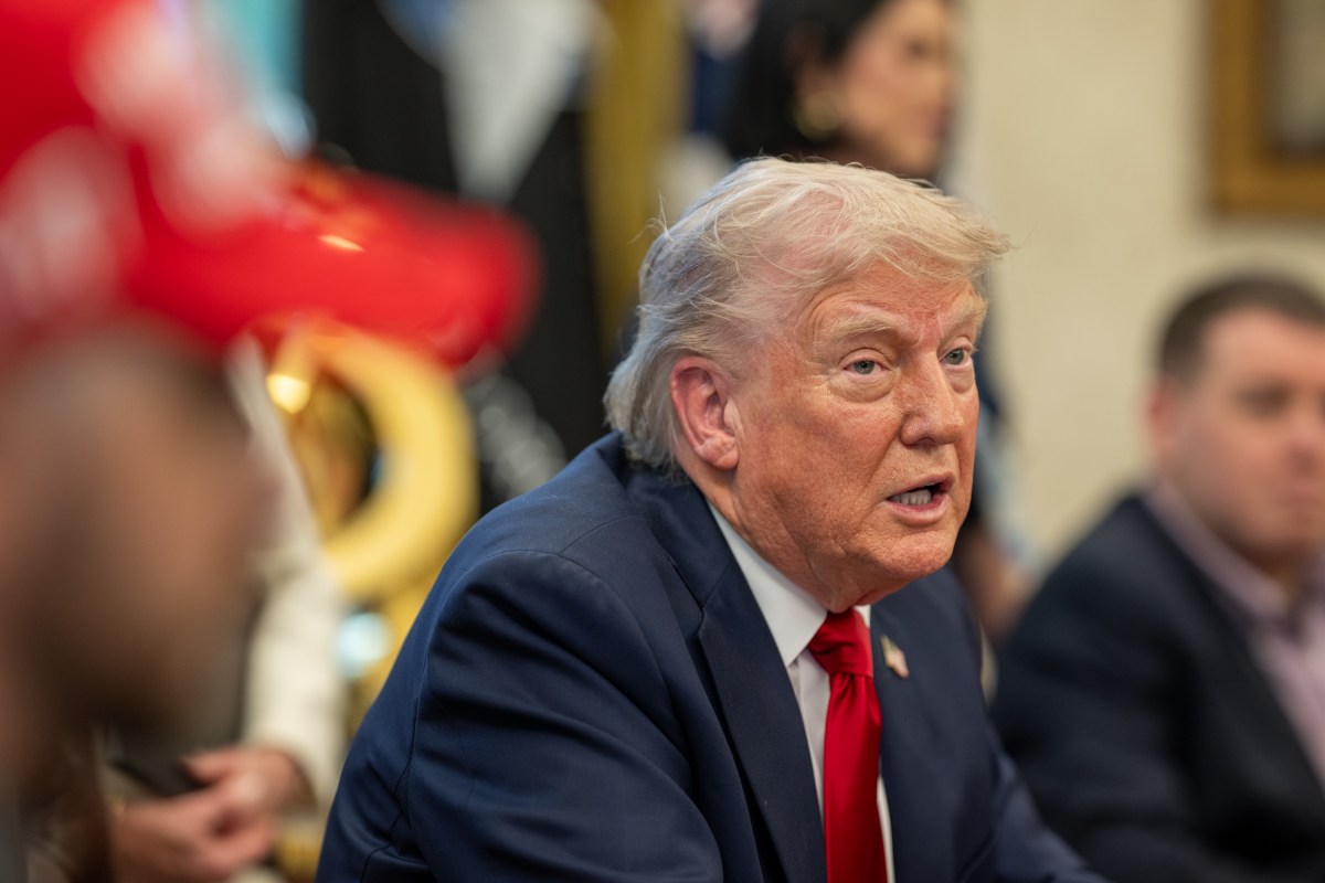 President Donald Trump signs executive orders alongside Secretary of Education Linda McMahon and wounded warriors in the Oval Office, Wednesday, April 23, 2025. (Official White House Photo by Daniel Torok)