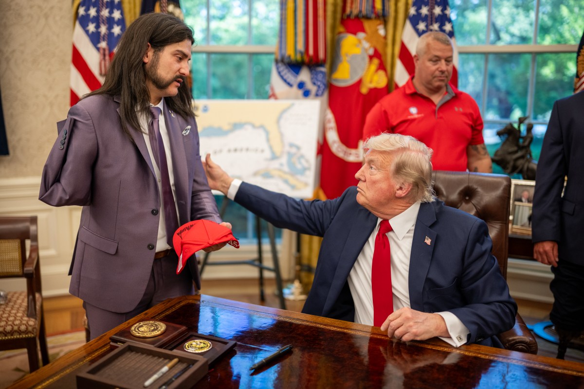 President Donald Trump signs executive orders alongside Secretary of Education Linda McMahon and wounded warriors in the Oval Office, Wednesday, April 23, 2025. (Official White House Photo by Daniel Torok)
