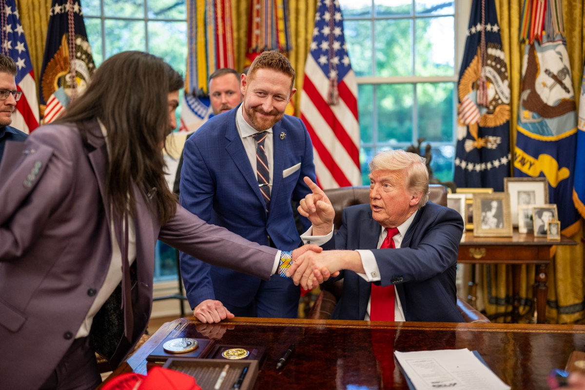 President Donald Trump signs executive orders alongside Secretary of Education Linda McMahon and wounded warriors in the Oval Office, Wednesday, April 23, 2025. (Official White House Photo by Daniel Torok)