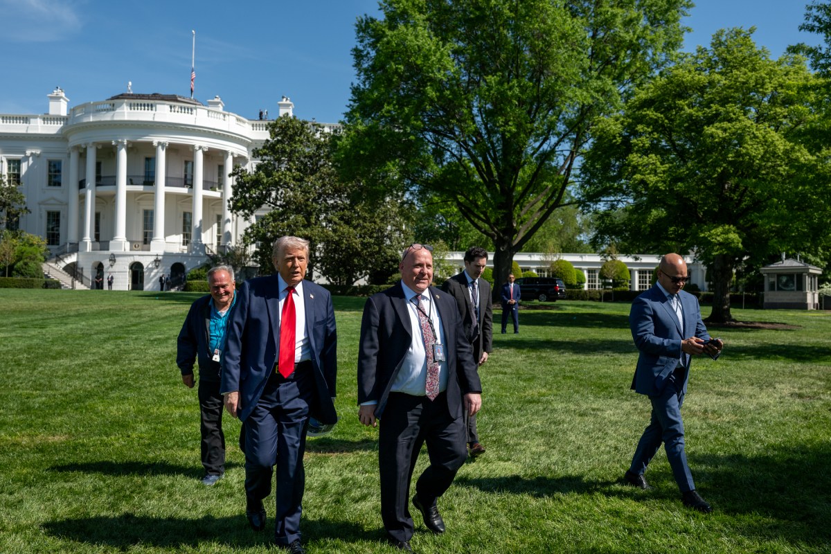President Donald Trump surveys the North and South Lawns of the White House for potential locations for new flag poles, Wednesday, April 23, 2025. (Official White House Photo by Joyce N. Boghosian)