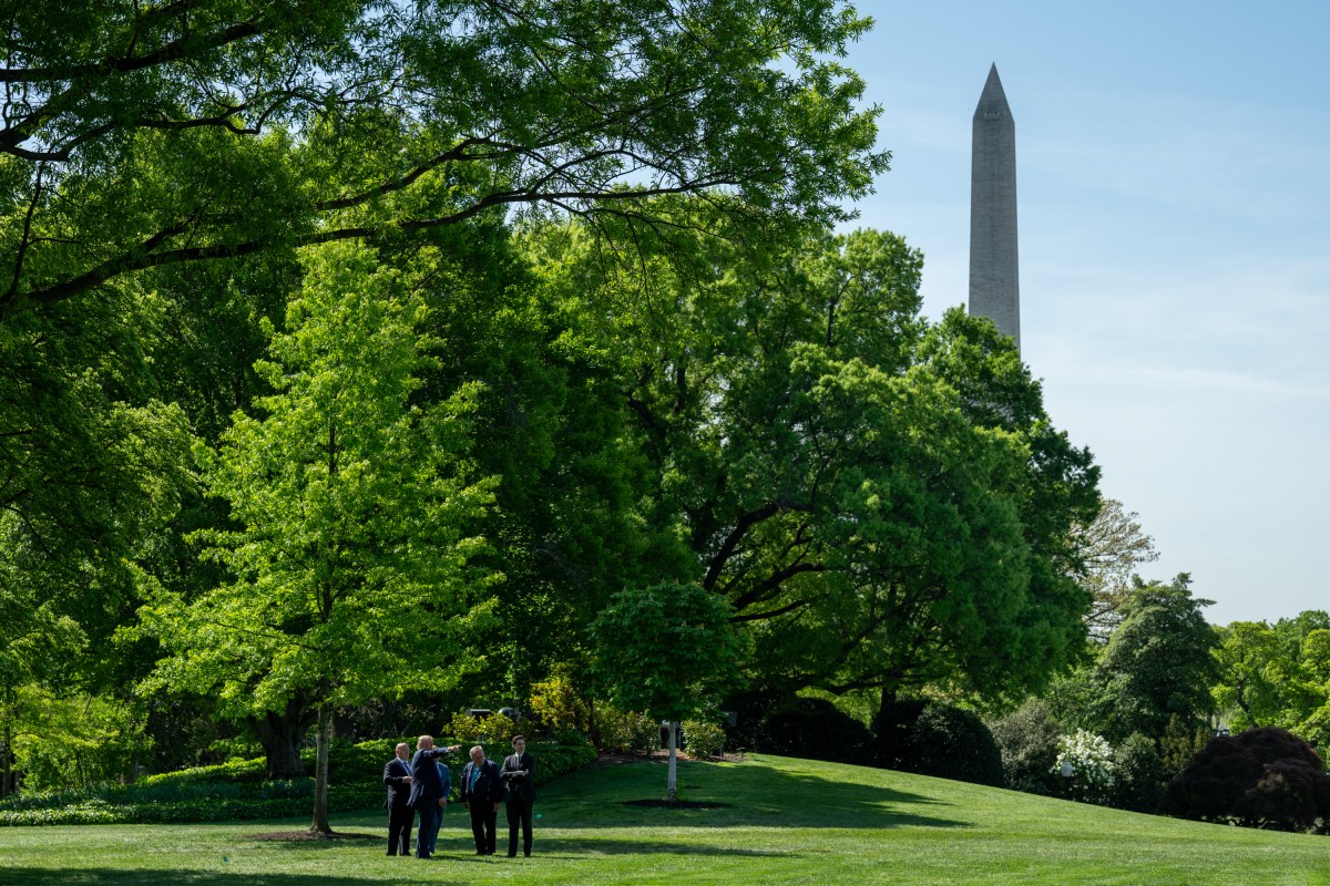 President Donald Trump surveys the North and South Lawns of the White House for potential locations for new flag poles, Wednesday, April 23, 2025. (Official White House Photo by Joyce N. Boghosian)