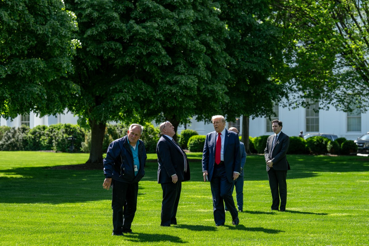 President Donald Trump surveys the North and South Lawns of the White House for potential locations for new flag poles, Wednesday, April 23, 2025. (Official White House Photo by Joyce N. Boghosian)
