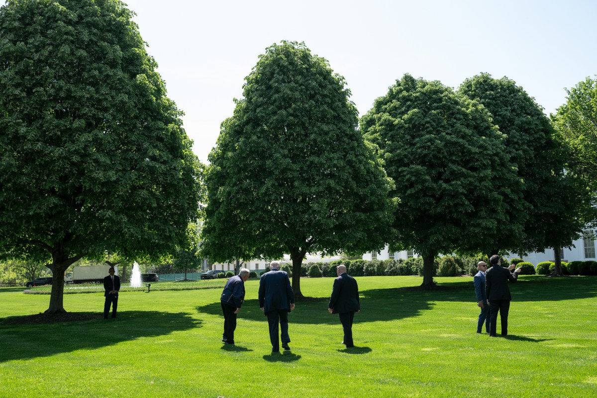 President Donald Trump surveys the North and South Lawns of the White House for potential locations for new flag poles, Wednesday, April 23, 2025. (Official White House Photo by Joyce N. Boghosian)