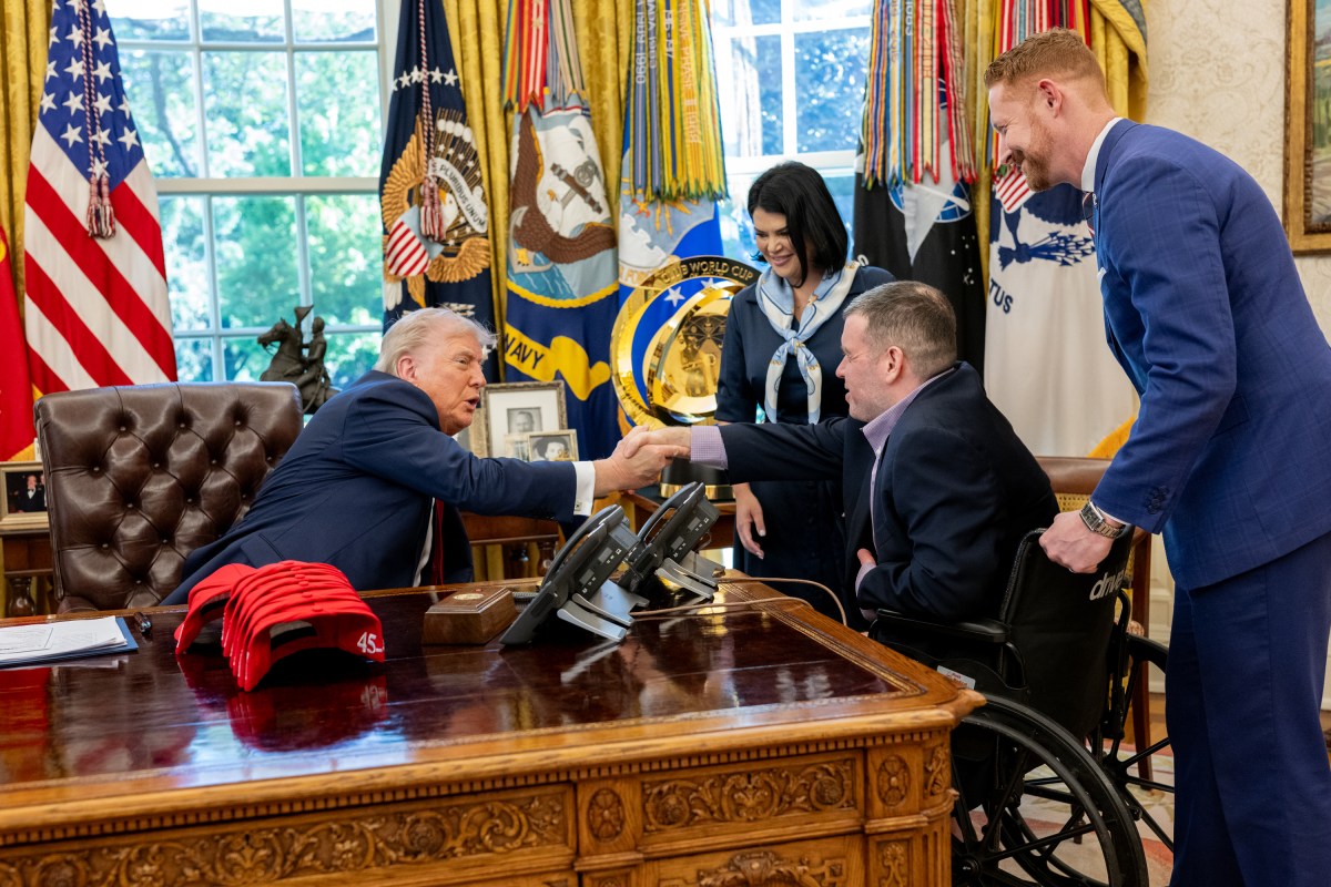 President Donald Trump signs executive orders alongside Secretary of Education Linda McMahon and wounded warriors in the Oval Office, Wednesday, April 23, 2025. (Official White House Photo by Molly Riley)