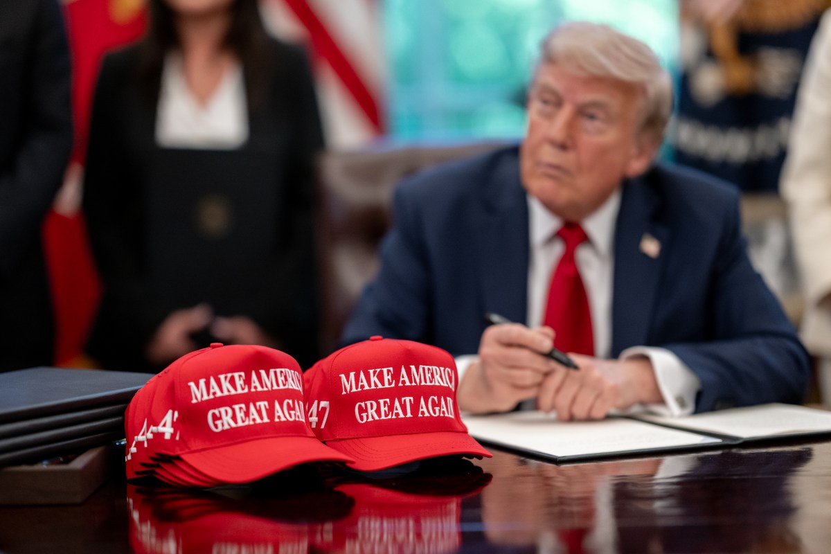 President Donald Trump signs executive orders alongside Secretary of Education Linda McMahon and wounded warriors in the Oval Office, Wednesday, April 23, 2025. (Official White House Photo by Molly Riley)